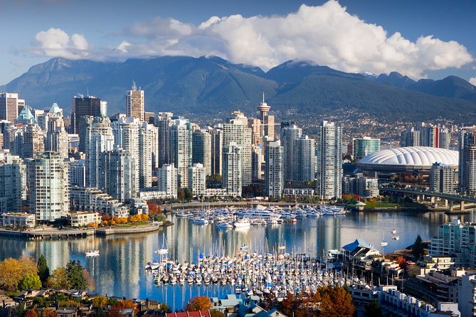 Arrival Transfer: Vancouver Airport YVR - Vancouver by Luxury SUV - Riding through Vancouver in a private luxury SUV