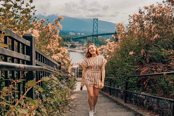 Explore Stanley Park on Electric Scooters - Siwash Rock, where forest meets the water