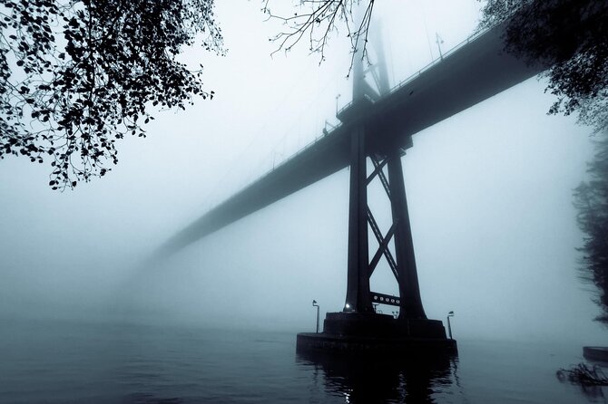Explore Stanley Park on Electric Scooters - The logging heritage arch