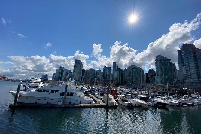 Private Guided Grand City Tour in Vancouver with your luggage - English Bay and Stanley Park supply the classic views