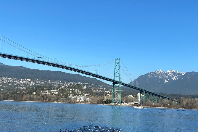 Private Guided Grand City Tour in Vancouver with your luggage - Crossing Lions Gate Bridge changes the view of the city