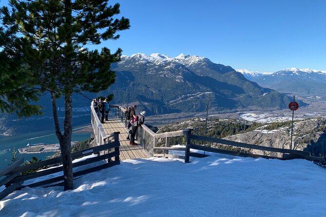 Snowshoeing At The Top Of The Sea To Sky Gondola - Crossing the Sky Pilot suspension bridge