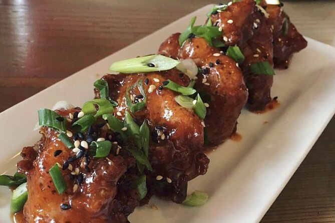 Vancouver Private Food Tour – Taste 6+ Local Dishes & Fresh Sushi - The Olympic Cauldron and modern Vancouver
