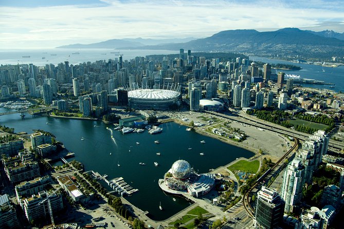 Vancouver Tour: Stanley Park, Granville Island & Capilano Bridge - Crossing Lions Gate Bridge into the North Shore